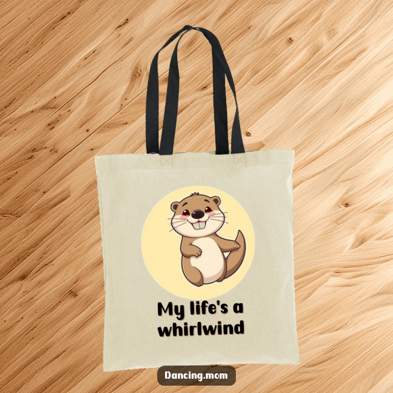 Funny tote bag with a cheerful otter spinning in circles with a goofy, happy grin, ideal for carrying joy.